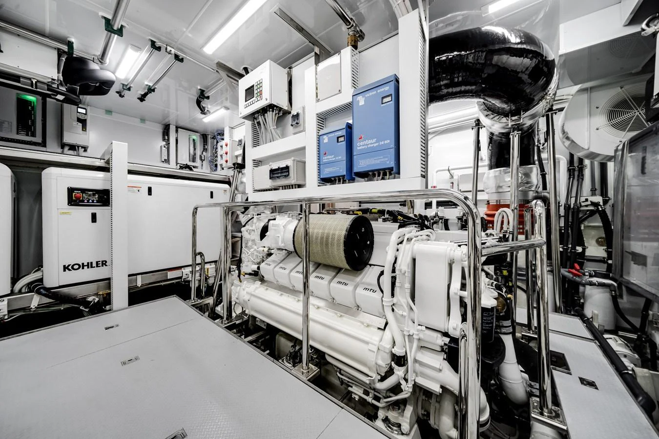 The engine room showcases advanced machinery and pristine organization. aboard OCEAN ALEXANDER 35P05 Yacht for Sale