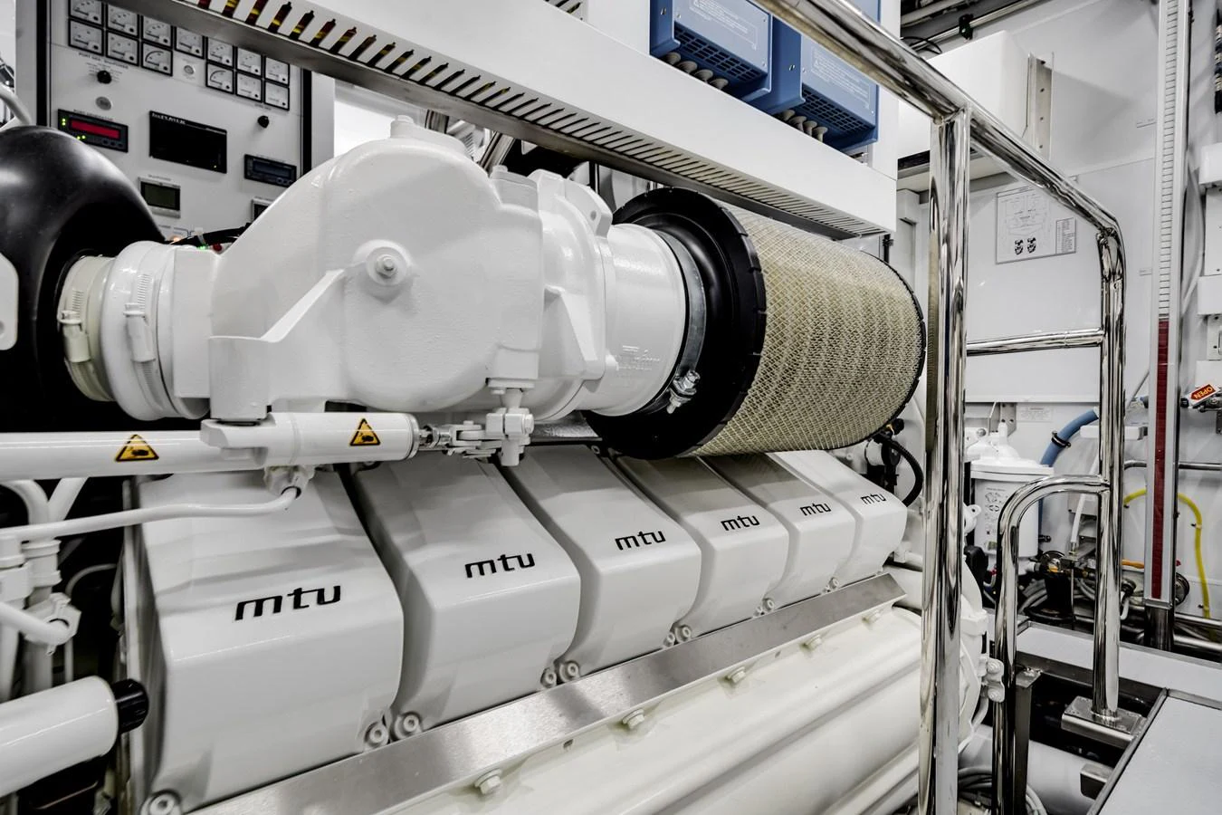 The image showcases the pristine and well-maintained engine room of the yacht, highlighting its advanced machinery. aboard OCEAN ALEXANDER 35P05 Yacht for Sale