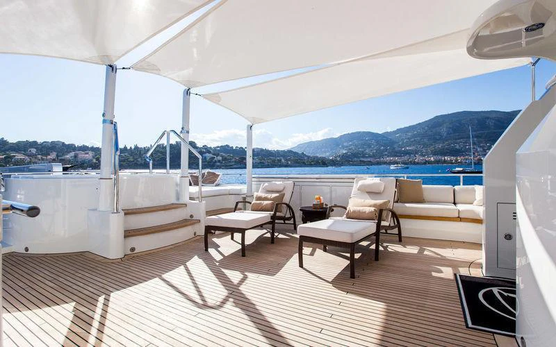 a room with a table and chairs aboard GALENA Yacht for Charter