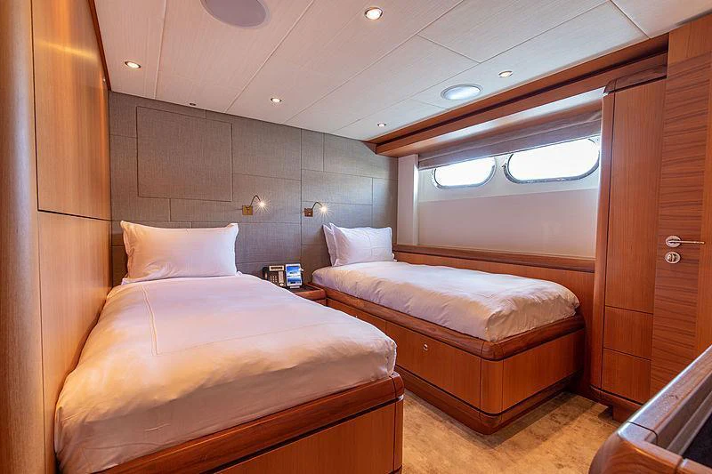 a room with two beds aboard GALENA Yacht for Charter
