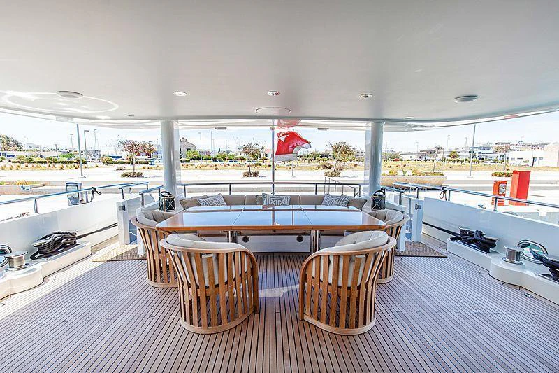 a room with a table and chairs aboard GALENA Yacht for Charter