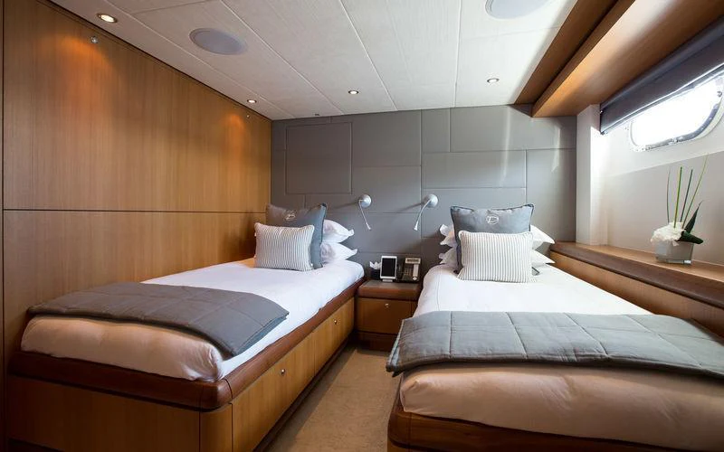 a room with two beds aboard GALENA Yacht for Charter