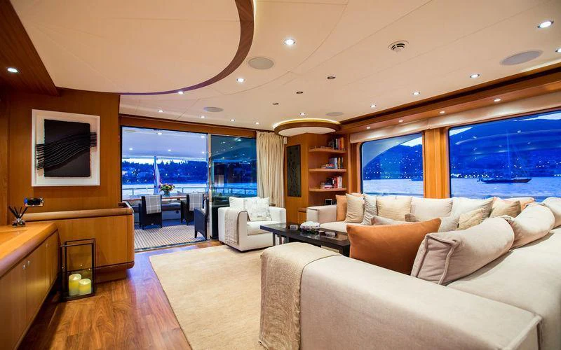 a living room with a large window aboard GALENA Yacht for Charter