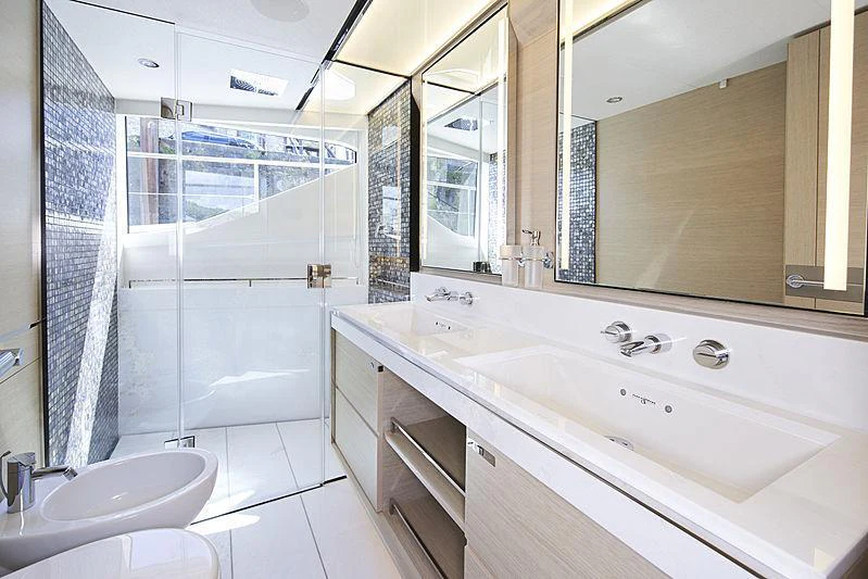 a bathroom with a large mirror aboard HALLELUJAH Yacht for Charter