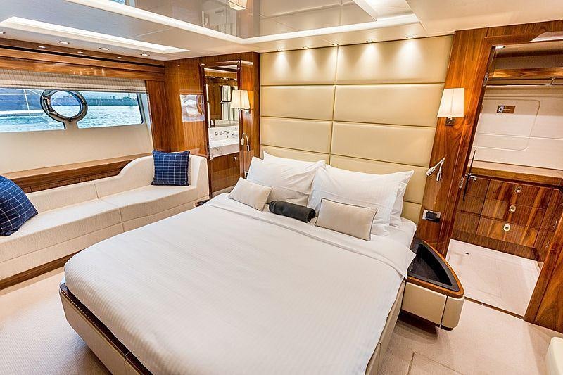 a room with a bed and a window aboard STARDUST OF MARY Yacht for Charter