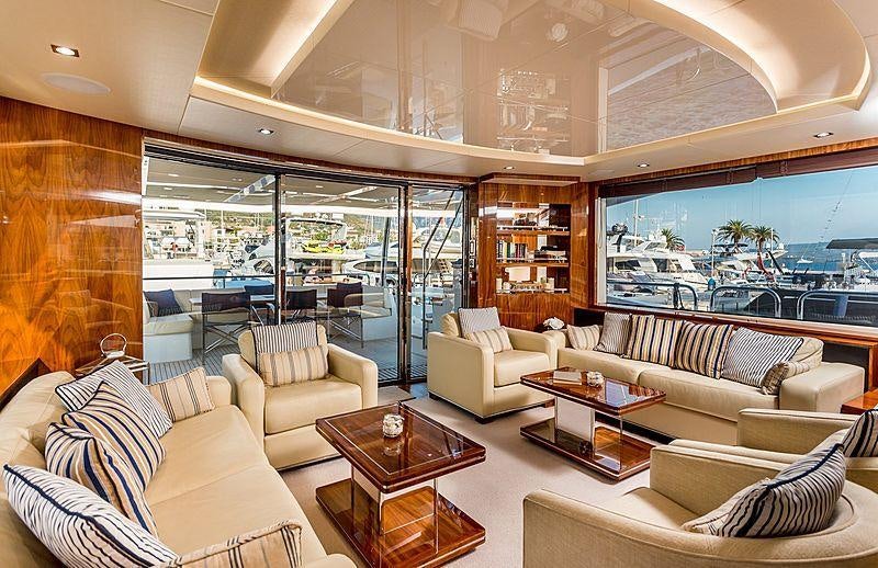 a living room with a large window aboard STARDUST OF MARY Yacht for Charter