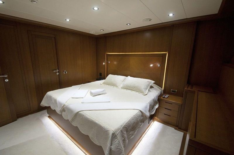 a bed in a room aboard SAN LIMI Yacht for Charter