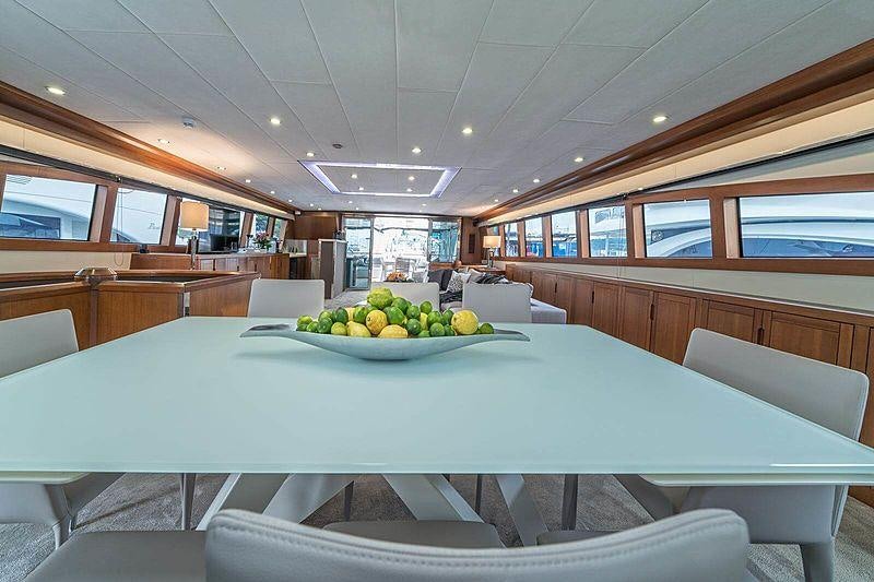 a table with fruit on it aboard SAN LIMI Yacht for Charter