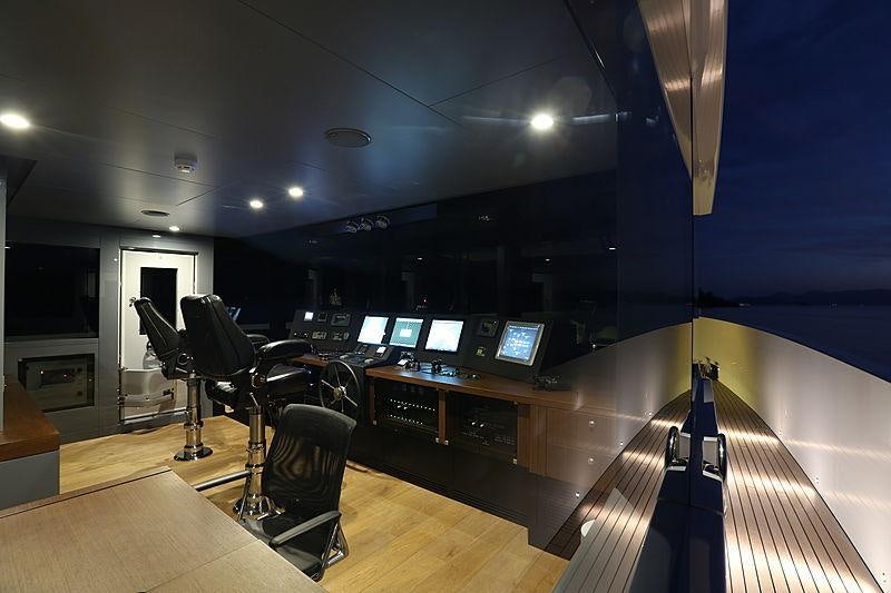 a room with a desk and chairs aboard ONLY NOW Yacht for Charter