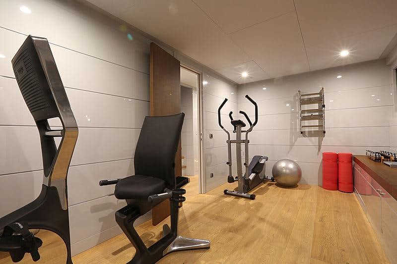 a room with a large exercise ball and a large vacuum aboard ONLY NOW Yacht for Charter