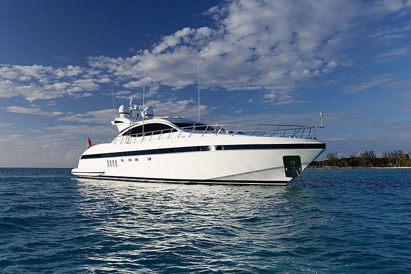 a white boat in the water aboard SMILE Yacht for Charter