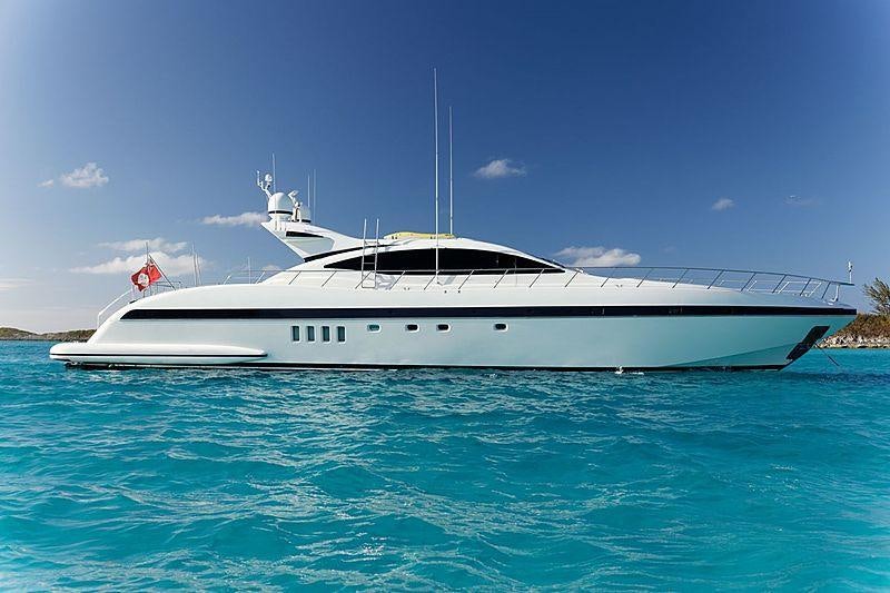 a white yacht in the water aboard SMILE Yacht for Charter
