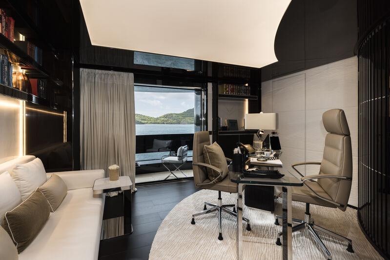 a room with a view of a city aboard RESILIENCE Yacht for Charter