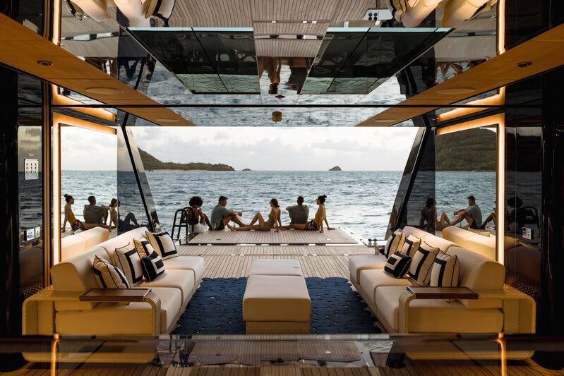 a large boat with people on it aboard RESILIENCE Yacht for Charter