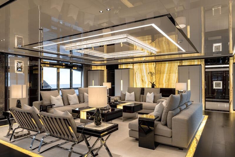 a living room with a large window aboard RESILIENCE Yacht for Charter