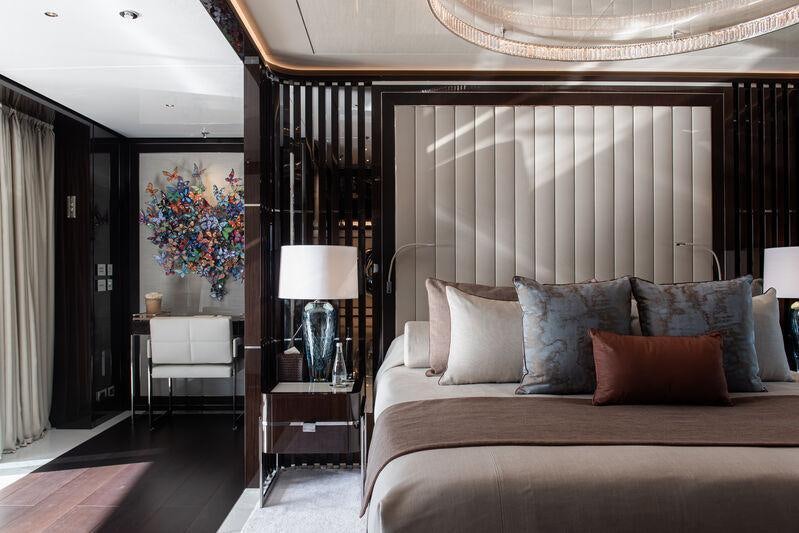 a large bed in a room aboard RESILIENCE Yacht for Charter