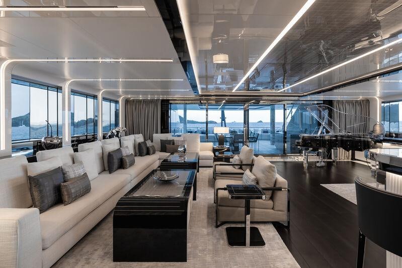 a living room with a large window aboard RESILIENCE Yacht for Charter