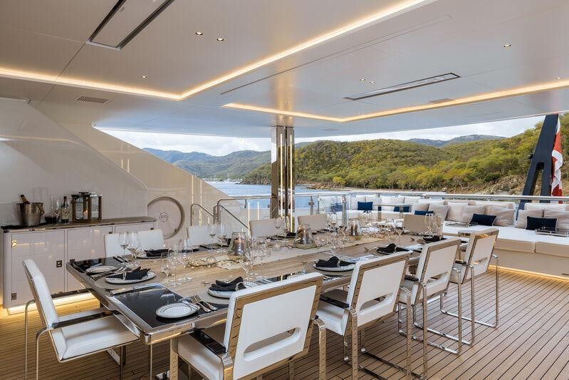 a large kitchen with a large island aboard RESILIENCE Yacht for Charter
