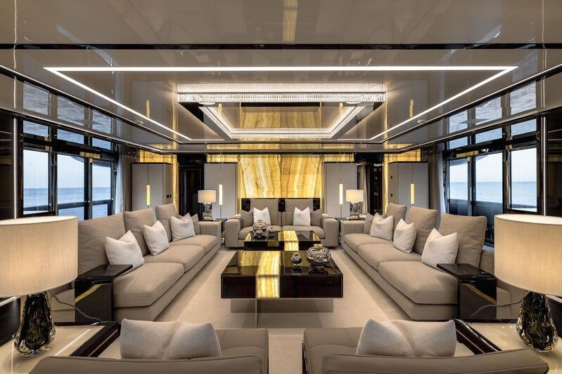 a living room with a large window aboard RESILIENCE Yacht for Charter