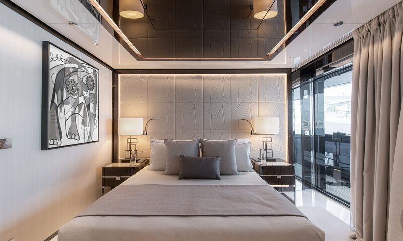 a large bed in a room aboard RESILIENCE Yacht for Charter