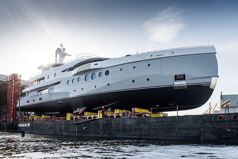 a large ship docked aboard STARDUST Yacht for Sale