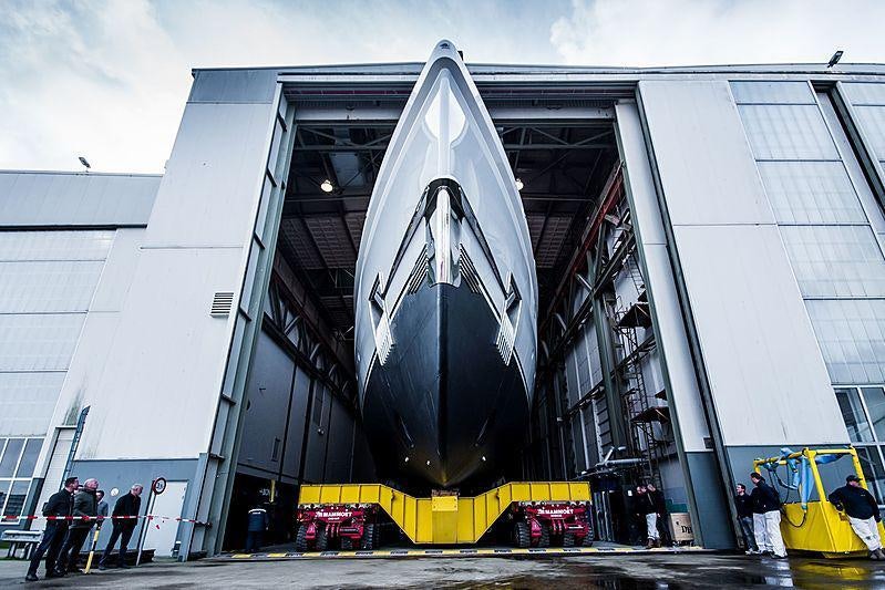 a large building with a large flag aboard STARDUST Yacht for Sale