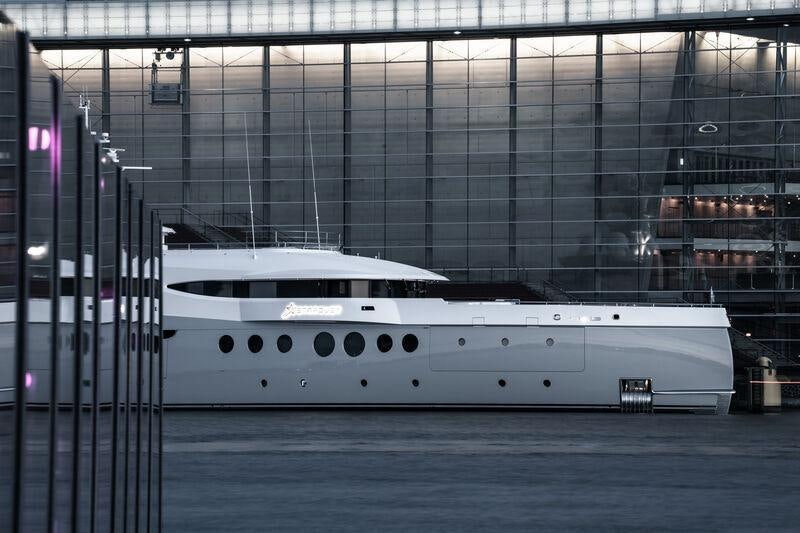 a white yacht in a large room aboard STARDUST Yacht for Sale