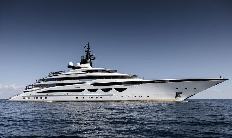 a large white ship in the water aboard AHPO Yacht for Charter