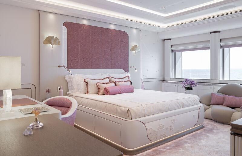 a large bed in a room aboard AHPO Yacht for Charter