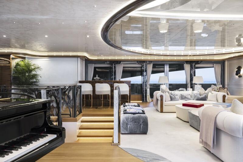 a modern looking living room aboard AHPO Yacht for Charter