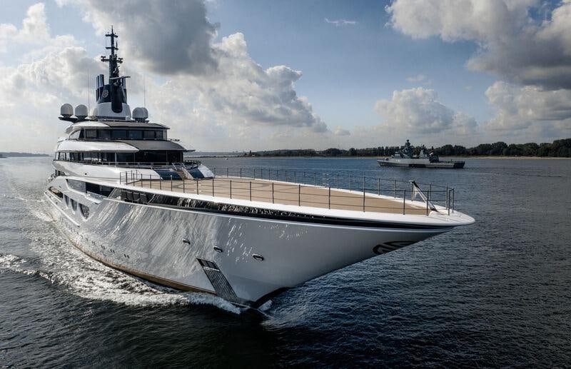 a large white ship in the water aboard AHPO Yacht for Charter