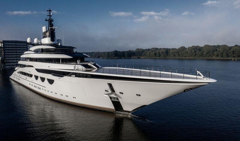 a large white boat in the water aboard AHPO Yacht for Charter