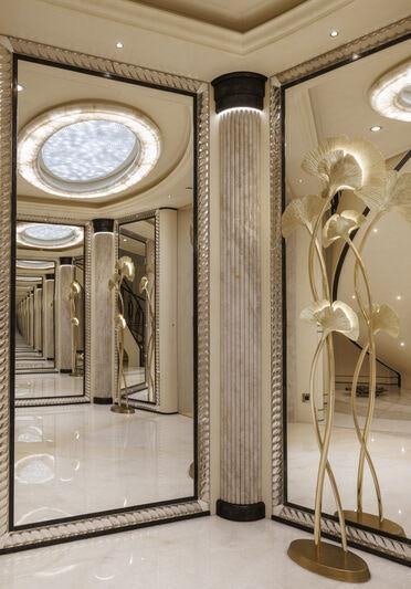 a fancy bathroom with a glass shower aboard AHPO Yacht for Charter