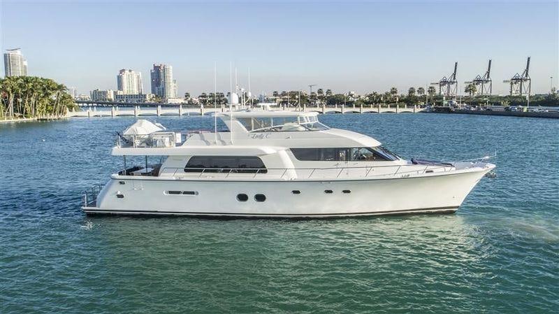 a white yacht in the water aboard TRANQUILITY Yacht for Charter