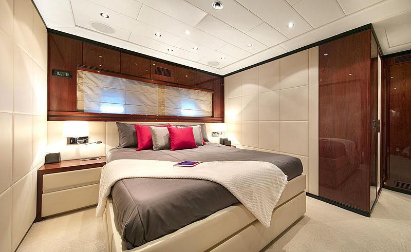 a bed in a room aboard LADY B Yacht for Charter