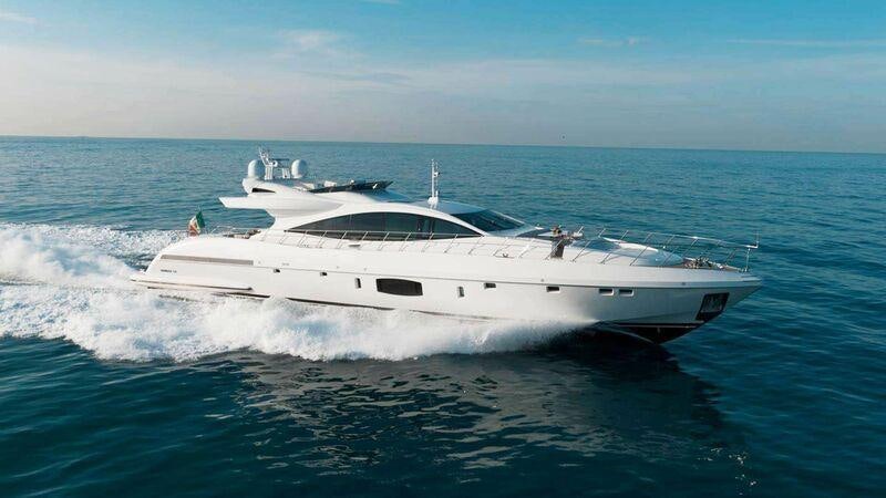 a white yacht in the water aboard IARY Yacht for Charter