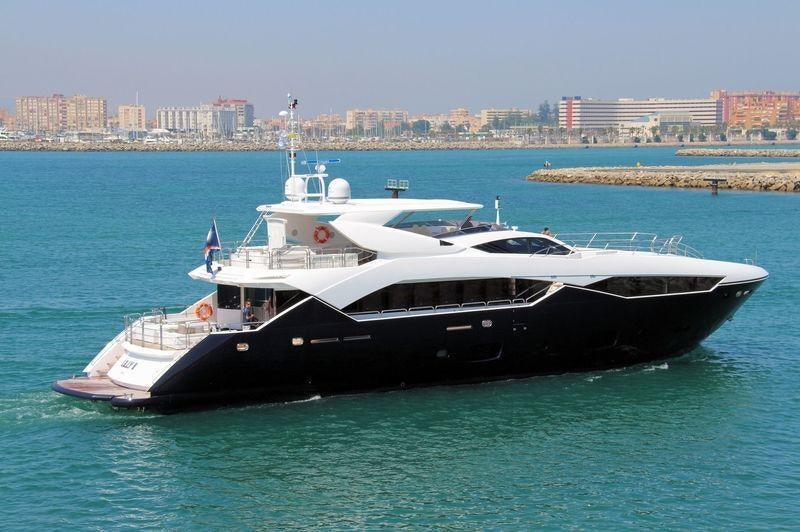 a large white boat in the water aboard EVEREAST Yacht for Charter