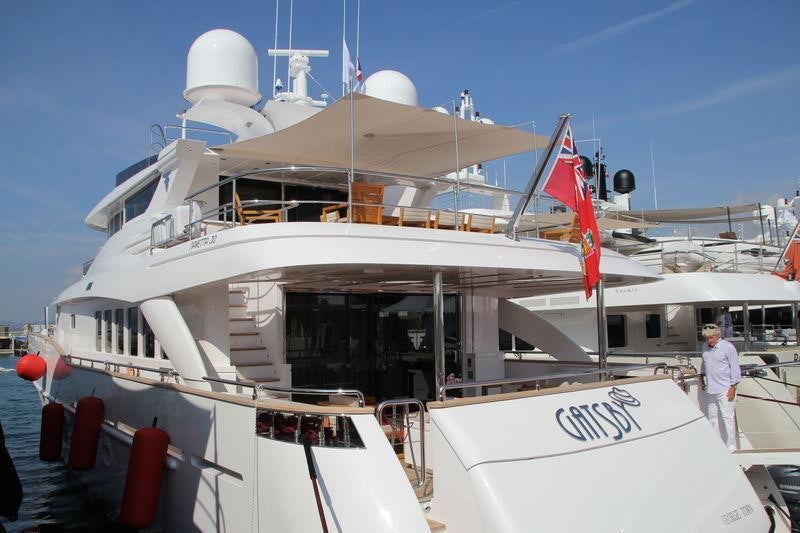 a person standing on a boat aboard GATSBY Yacht for Charter