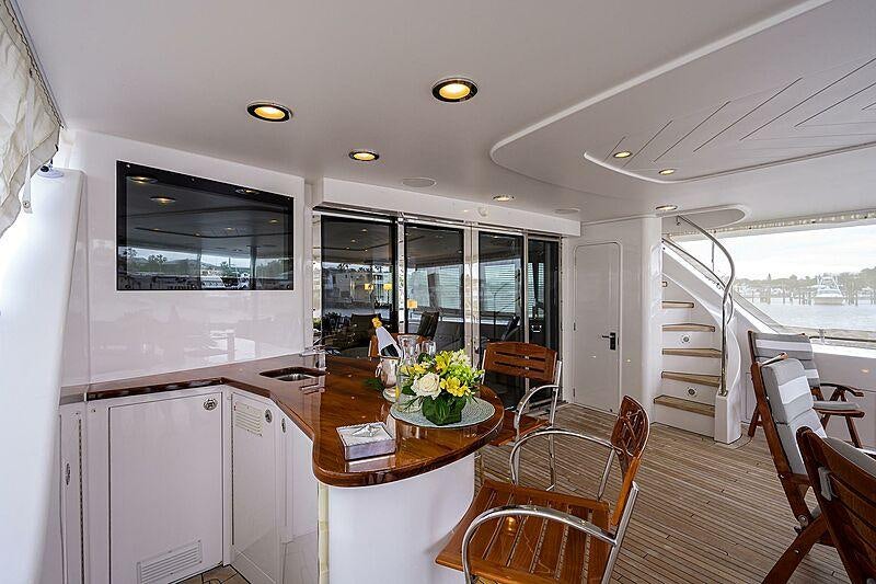 a kitchen with a dining table aboard UNWINED Yacht for Charter
