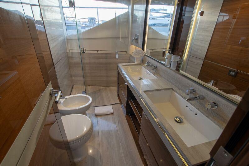 a bathroom with a large tub aboard KOHUBA Yacht for Charter