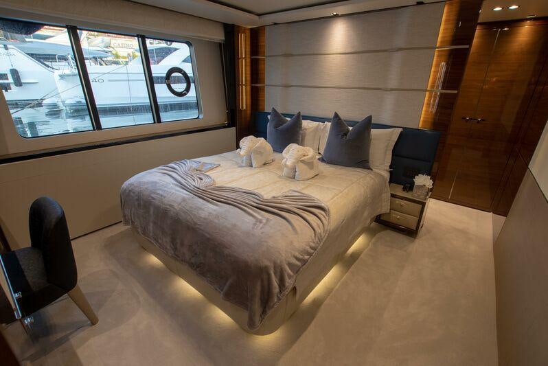 a bed in a room aboard KOHUBA Yacht for Charter