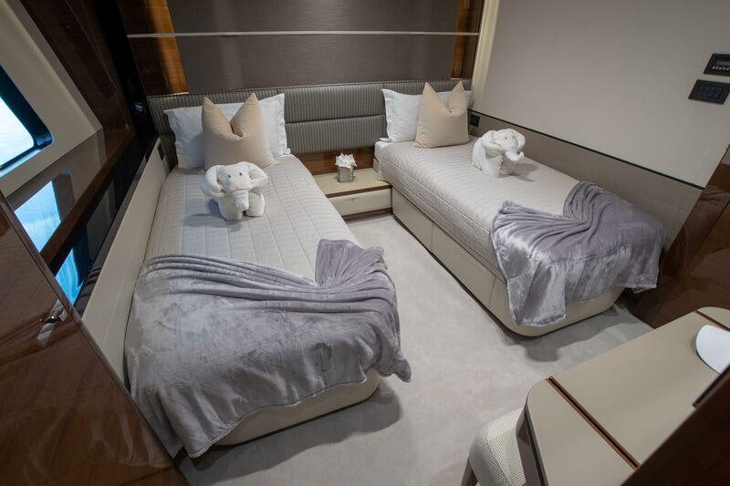 a couple of beds in a room aboard KOHUBA Yacht for Charter