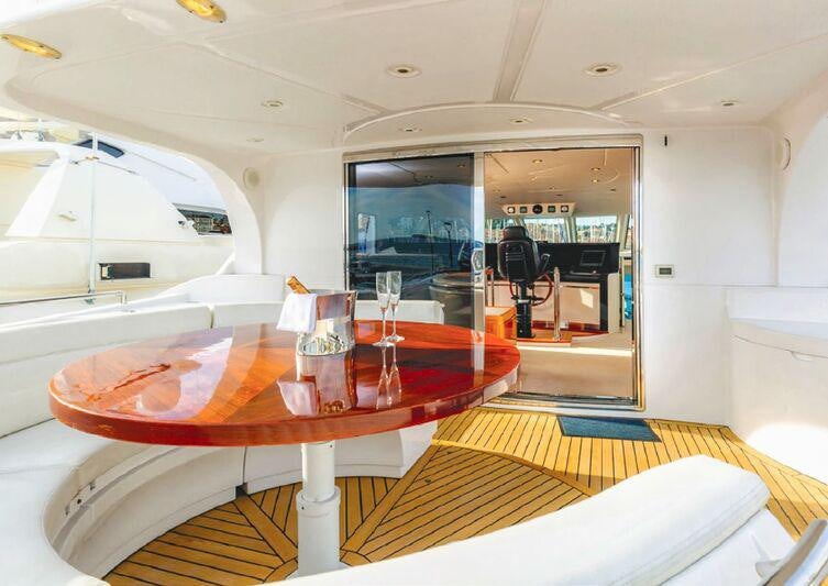 a table with glasses on it aboard SEA BREEZE ONE Yacht for Charter