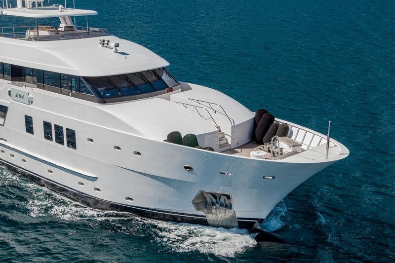 a large white ship aboard ATOM Yacht for Charter