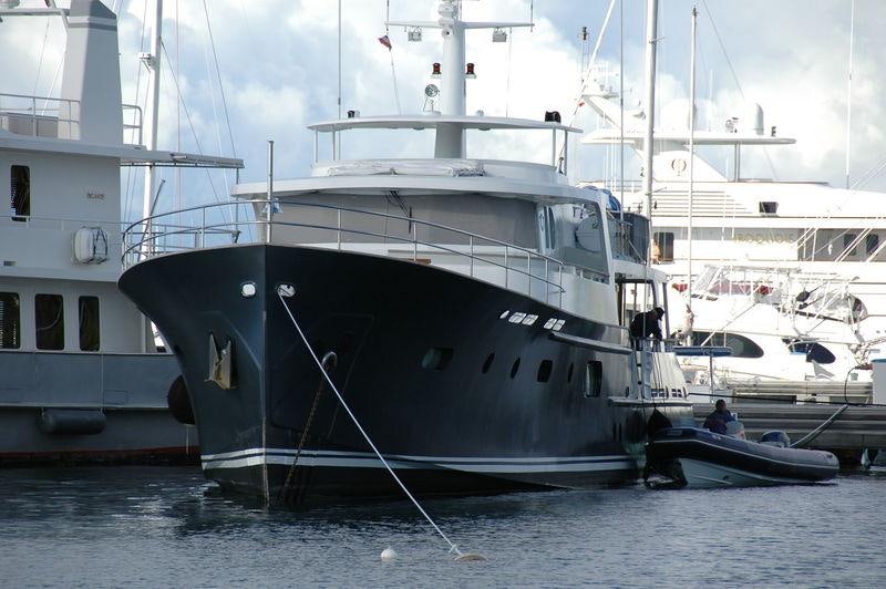 a boat docked at a pier aboard ABELY Yacht for Charter