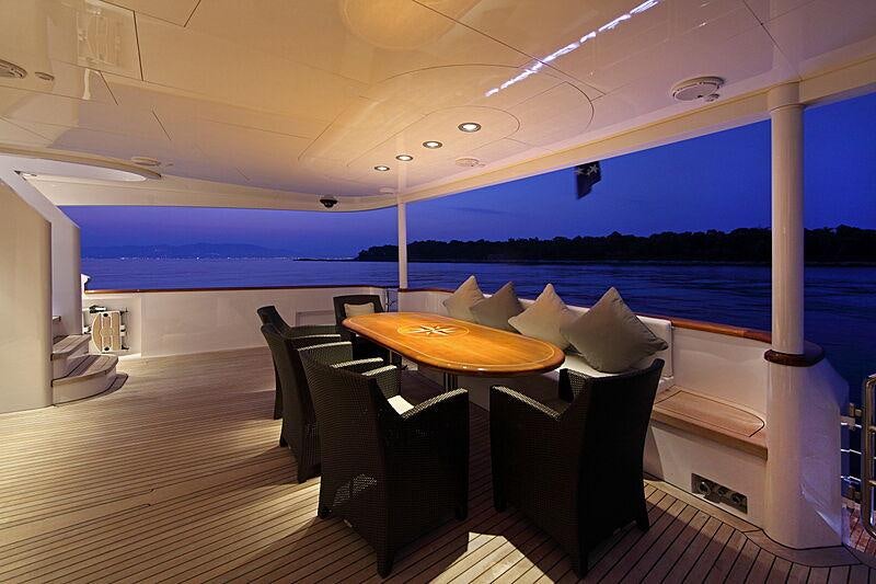 a room with a table and chairs aboard SEA SHELL Yacht for Charter