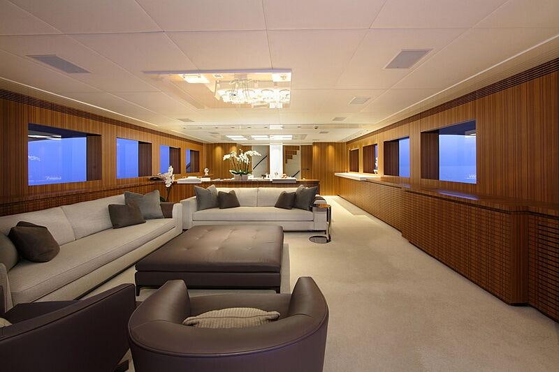 a room with couches and a tv aboard SEA SHELL Yacht for Charter