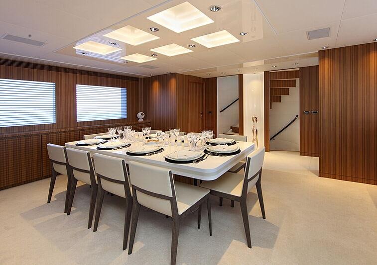 a conference room with a table and chairs aboard SEA SHELL Yacht for Charter