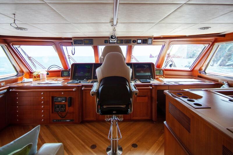 a room with a desk and computer aboard CORNELIA Yacht for Charter