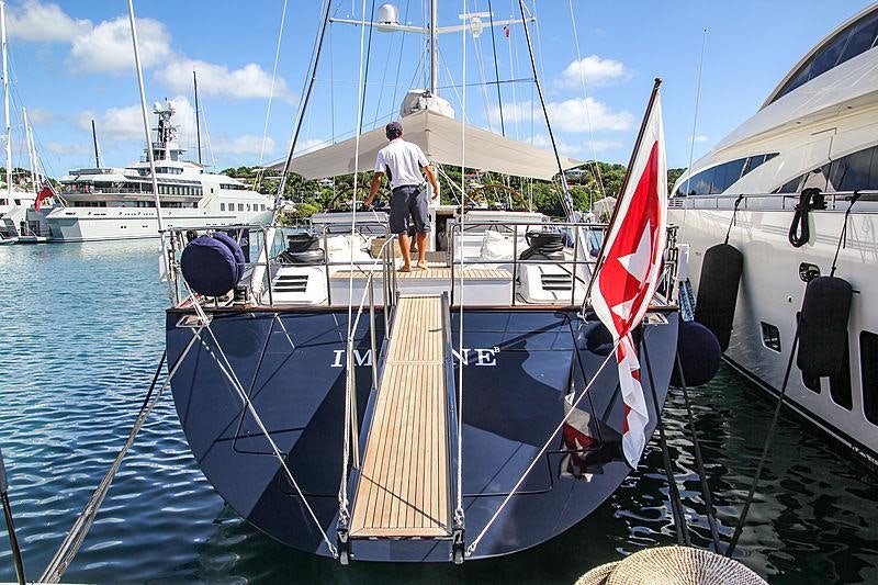 a boat with a sail aboard IMAGINE Yacht for Charter